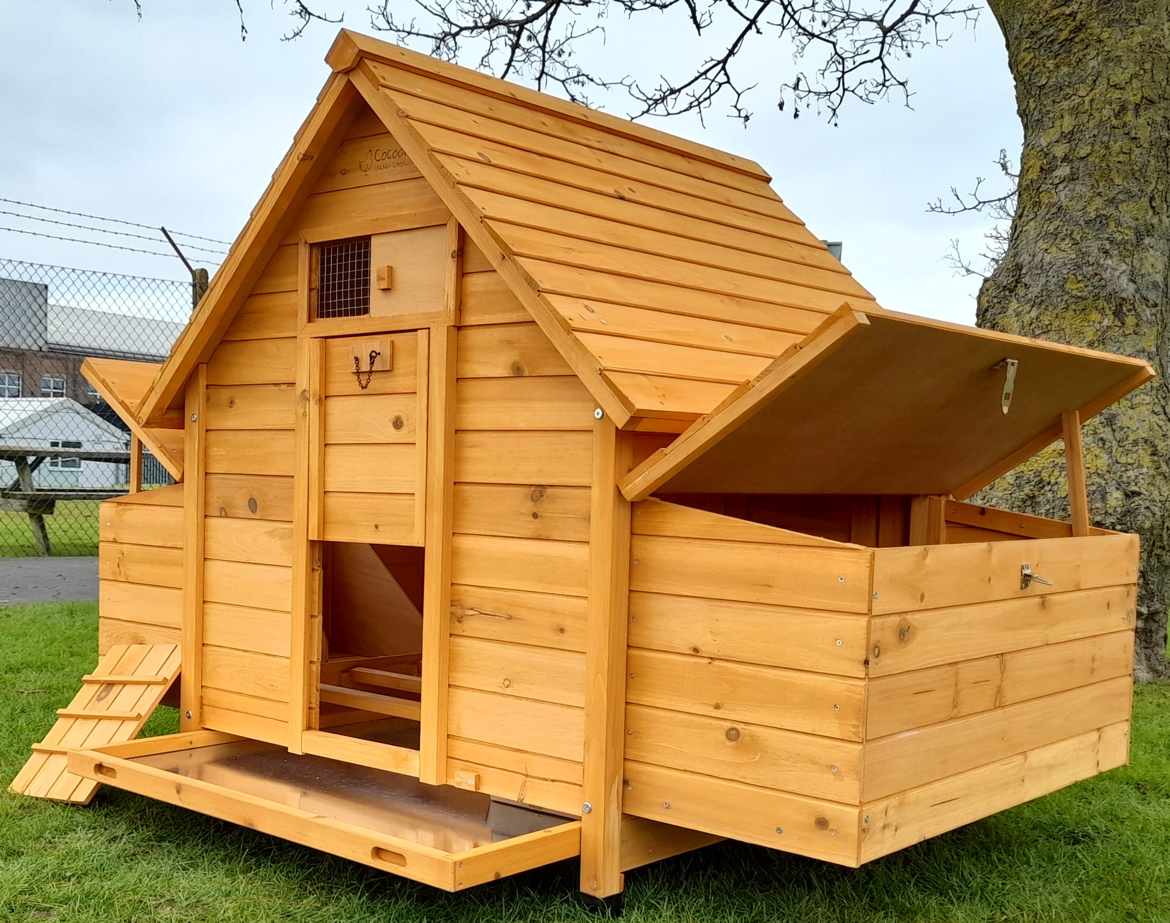 House design chicken coop with two nest boxes that have opening roofs