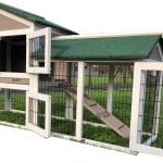 grey and white rabbit hutch with green roof and rabbit run