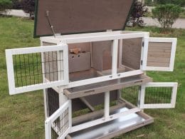 Grey rabbit hutch with opening roof and hutch doors