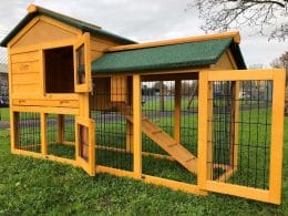 wooden, raised rabbit hutch with run