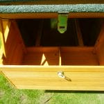 Raised chicken coop with run and nest box